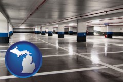 michigan map icon and an empty parking garage