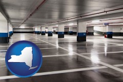 new-york map icon and an empty parking garage