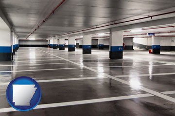 an empty parking garage - with Arkansas icon