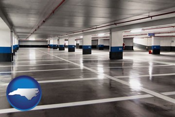 an empty parking garage - with North Carolina icon