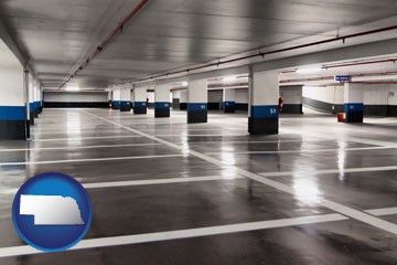 an empty parking garage - with Nebraska icon