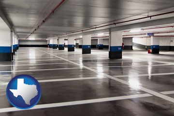 an empty parking garage - with Texas icon