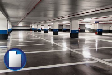 an empty parking garage - with Utah icon